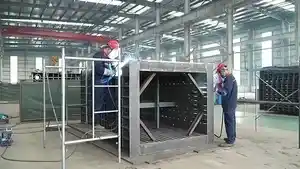 أعمال اللحام والتجميع لهيكل المكبس